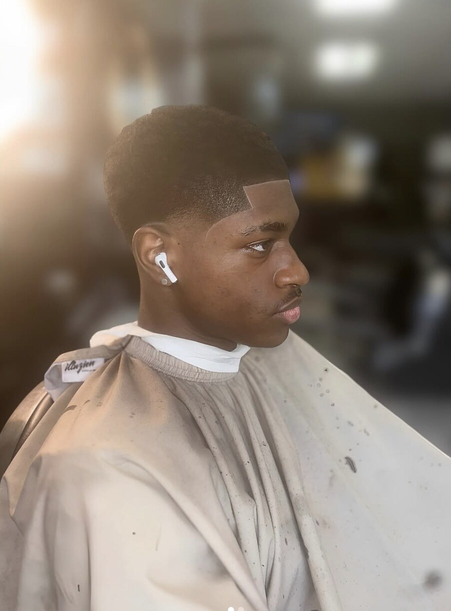 Clean taper and sharp front lineup by ScoobioThaBarber