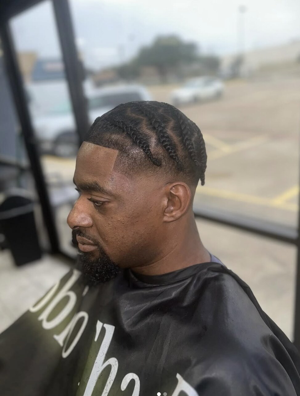 Braided style with clean taper and edge work by ScoobioThaBarber