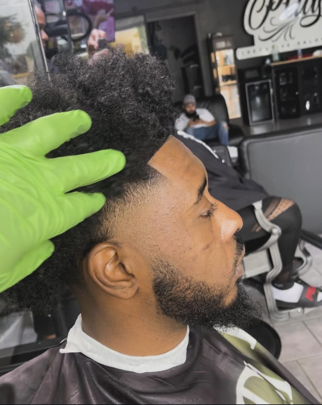 Textured side profile cut with crisp hairline by ScoobioThaBarber